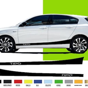 May include: A white Fiat Tipo hatchback with black side stripes and the word "TIPO" on the stripes. The car has black and silver alloy wheels. Colour swatches at the bottom include white, black, red, yellow, blue, and green.