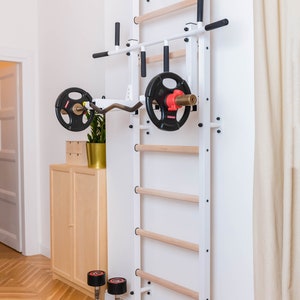 BenchK wall bars with a convertible steel 6-grip pull-up bar used as a barbell holder