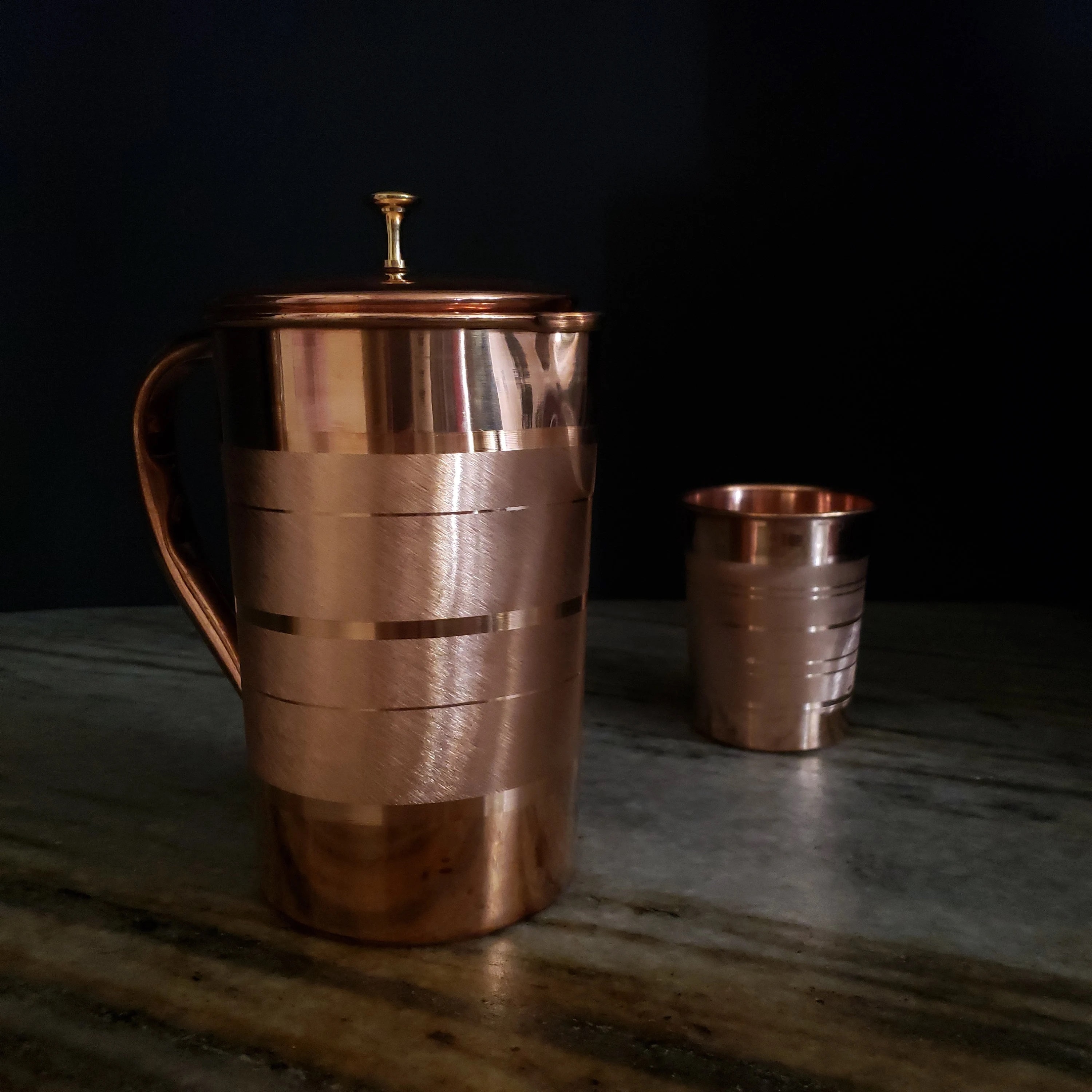 Pure Copper Water Pitcher Jug With Handle And Copper Lid With Brass Knob Polished Indian Copper With Brushed Design with a Copper Cup