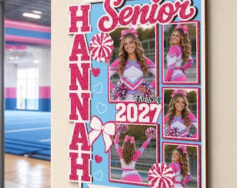 May include: A rectangular wall sign featuring the name HANNAH in large pink glitter letters, the word Senior, and the year 2027. The design includes four photographs of a cheerleader in a pink and white uniform, pink pom-poms, and bows.