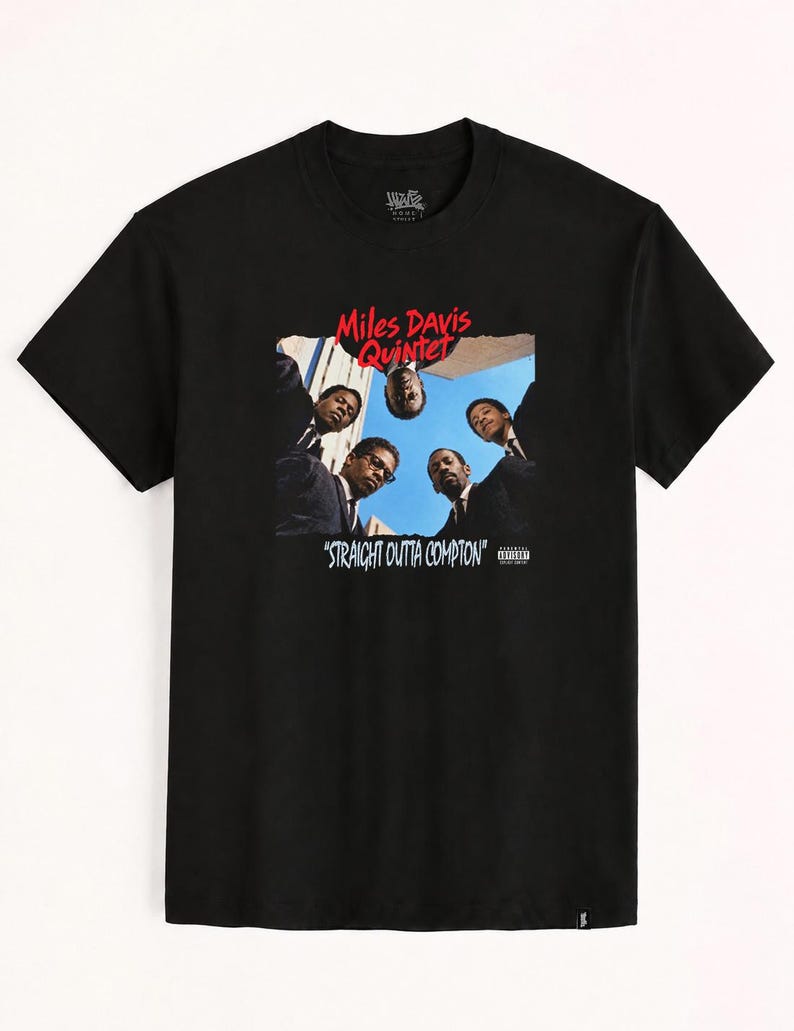 May include: A black short-sleeved t-shirt featuring a graphic print of the Miles Davis Quintet looking down from above. The red text reads Miles Davis Quintet and the white text reads STRAIGHT OUTTA COMPTON with a Parental Advisory label.