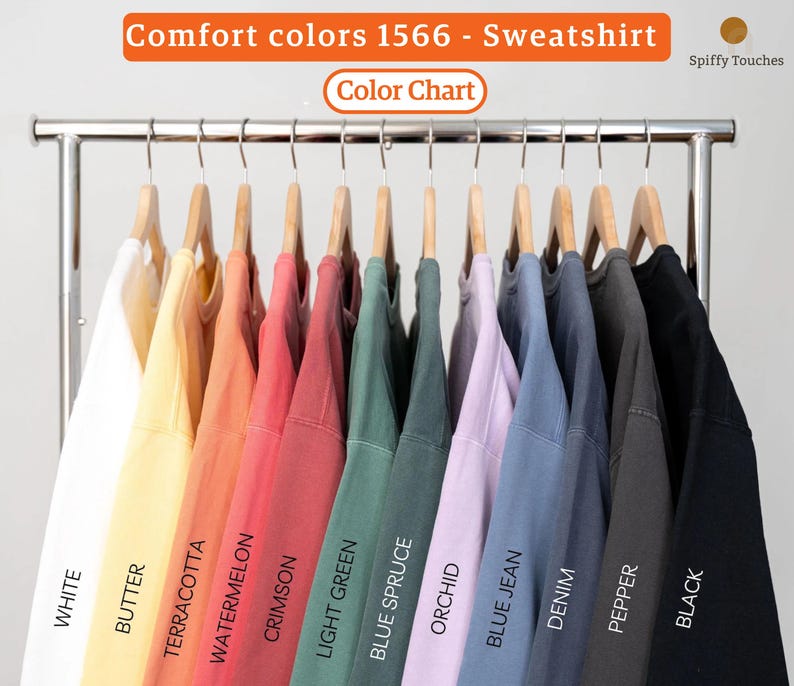 May include: Color chart showing 12 different colors of sweatshirts. The colors are: white, butter, terracotta, watermelon, crimson, light green, blue spruce, orchid, blue jean, denim, pepper, and black.