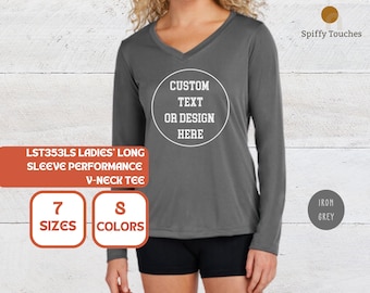 Camiseta feminina personalizada de manga comprida com decote em V e tecido tecnológico que absorve a umidade.