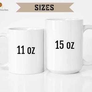 May include: Two white ceramic mugs, one 11 oz and one 15 oz, on a white surface.  The mugs are blank and ready for personalization.