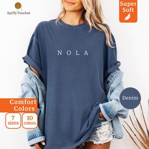 Oversized NOLA T-shirt, Women’s Denim Blue Tee, Loose Fit Graphic Shirt, Casual Comfort Wear, Available in 7 Sizes, 10 Colors