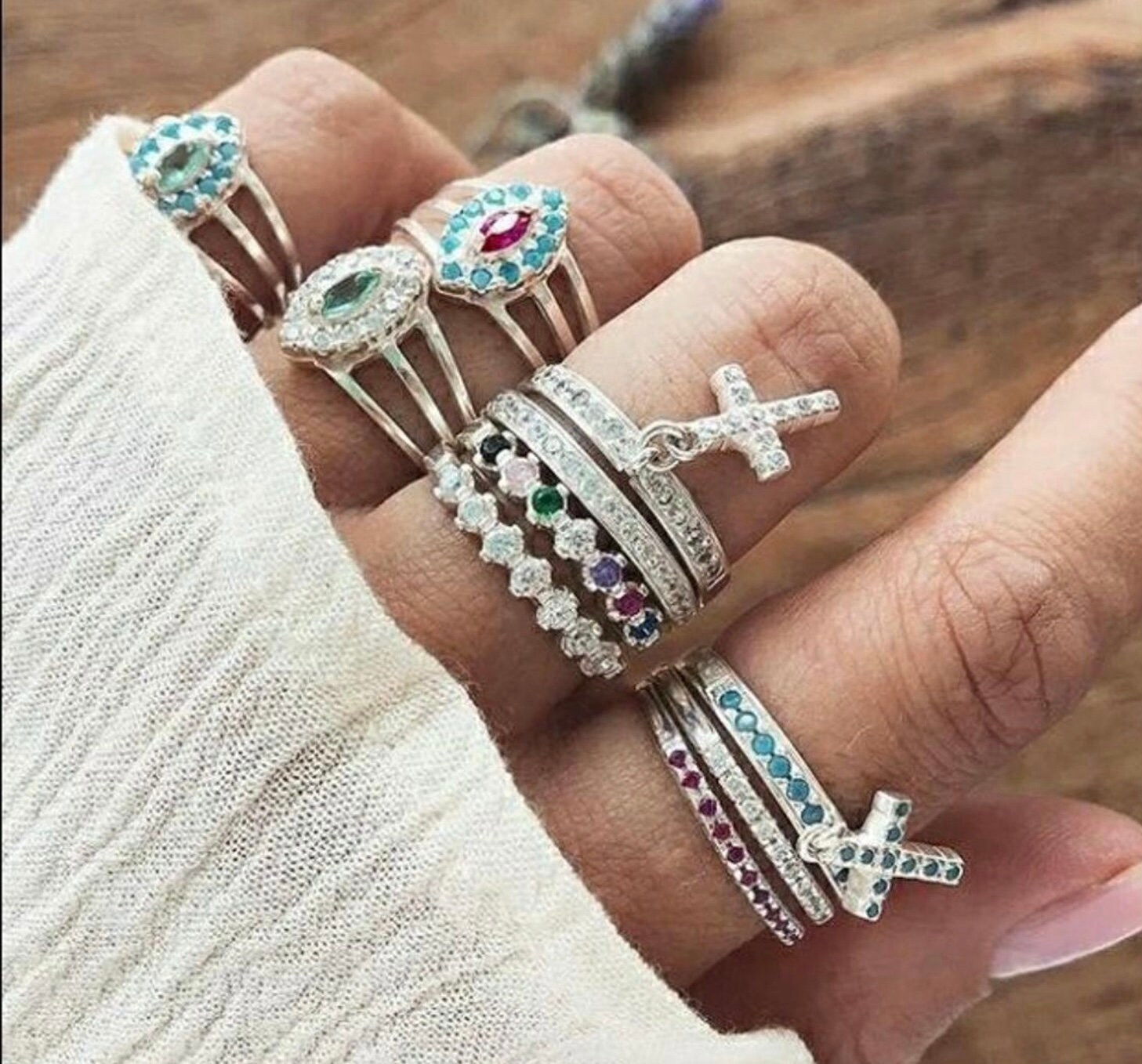 Dangle cross ring deals