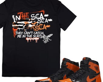 retro 1 electro orange shirt