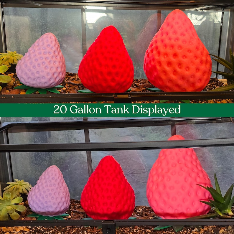 Pink and red strawberry reptile hides displayed together in three sizes
