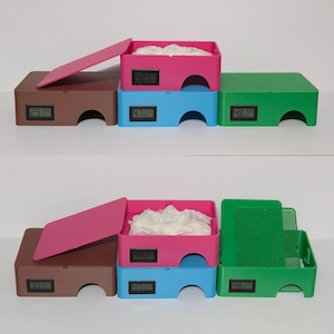 Reptile humid hides displayed in magenta, blue, green, and brown color options