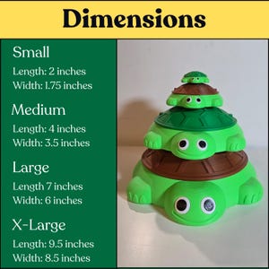 May include: A stack of four green and brown turtle figures with printed dimensions: Small 2 inches by 1.75 inches, Medium 4 inches by 3.5 inches, Large 7 inches by 6 inches, and X-Large 9.5 inches by 8.5 inches. The turtles have white eyes with black pupils.