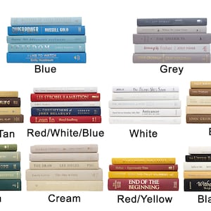 May include: A collection of stacked books in various colors, including blue, grey, white, beige, brown, tan, red, yellow, green, cream, and black. The books are arranged in a grid pattern with the color of each stack labeled below.