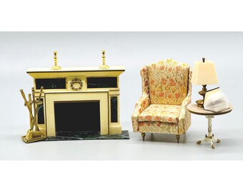 Muebles ideales para casa de muñecas de princesa pequeña estilo Regencia: chimenea, sillón orejero y mesa.