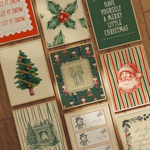 May include: A collection of Christmas-themed art prints. The prints feature festive designs such as a Christmas tree, Santa Claus, holly, and the text "LET IT SNOW" and "HAVE YOURSELF A MERRY LITTLE CHRISTMAS". The prints are displayed on a wooden surface.