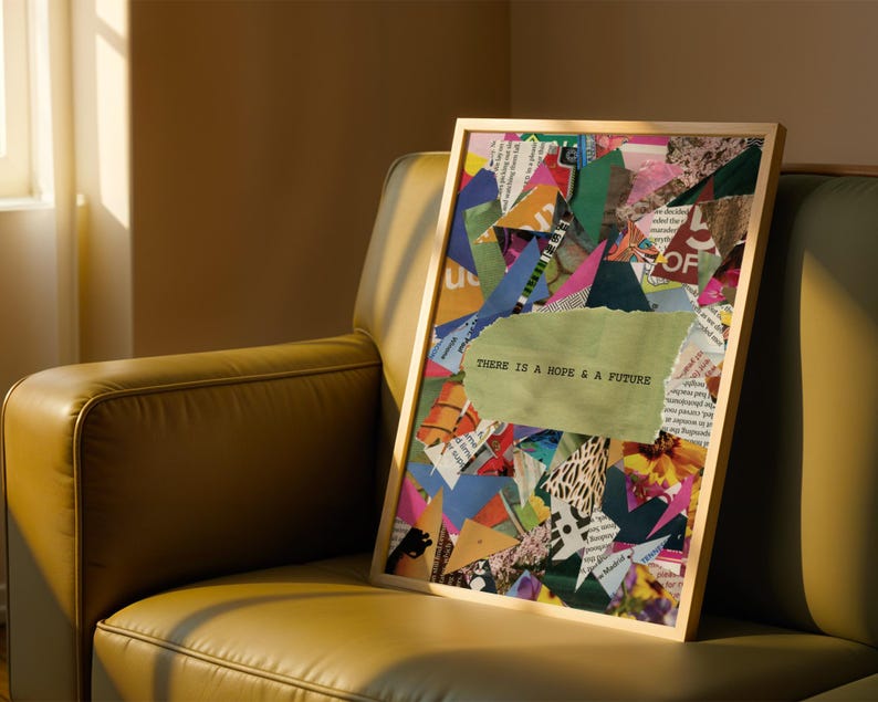 May include: A framed collage of colorful paper scraps with the text "THERE IS A HOPE & A FUTURE" in a green font. The collage is in a wooden frame and is sitting on a brown leather couch.
