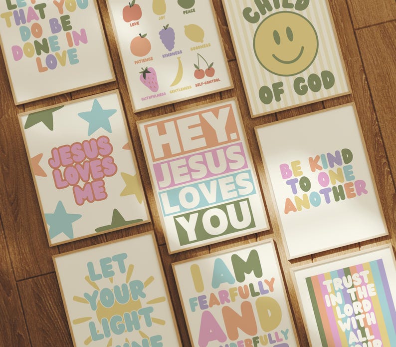 May include: A collection of framed art prints with inspirational quotes and phrases in various colors. The prints feature phrases like "Jesus Loves Me," "Be Kind to One Another," and "Let Your Light Shine."
