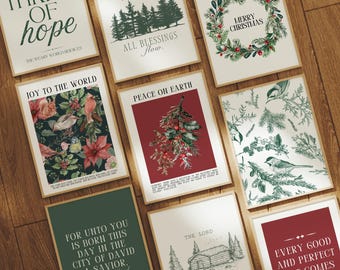 May include: Set of ten printable Christmas-themed wall art prints with various designs and quotes. The prints feature a red, green, and white color scheme with illustrations of holly, pine branches, and birds. The quotes include "Thrill of Hope", "Joy to the World", "Peace on Earth", "For Unto You is Born This Day", "The Lord", "Merry Christmas", "Every Good and Perfect Gift Comes From Above", and "Praise From Whom All Blessings Flow."