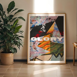 May include: A framed abstract art print featuring a colourful geometric design and the word "GLORY" in white lettering.