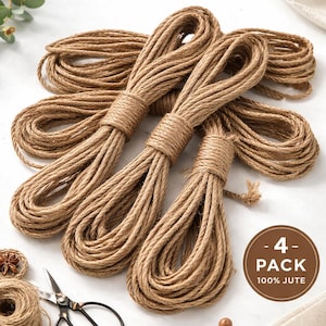 May include: A set of four bundles of natural jute rope, ideal for Shibari. The image shows several coils of rope, each tightly bound with twine. A pair of scissors and a small spool of jute rope are also visible, along with the text "Jute Rope Set FOR SHIBARI".