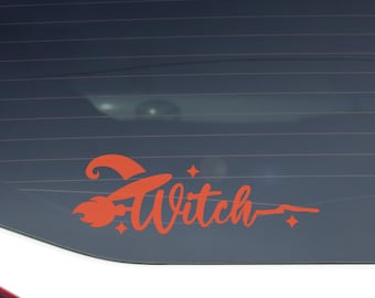 May include: Orange vinyl car decal featuring the word "Witch" in a stylized script, accompanied by a witch hat and stars. The decal is affixed to the rear window of a white car, perfect for Halloween.