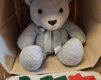 Pastel blue Teddy bear for adoption