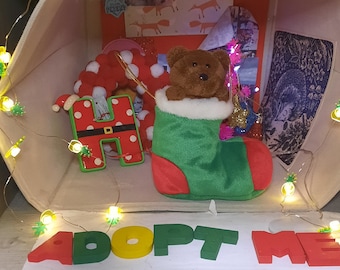 TY bear in stocking for adoption