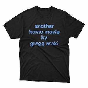 May include: Black t-shirt with the text "another homo movie by gregg araki" in blue.