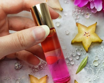 Óleo Perfumado Roll-on | Fragrância exclusiva, aconchegante e sensual, com toques de bruxaria. Longa duração em frasco de vidro degradê.