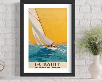 May include: A vintage travel poster featuring a sailboat with white sails against a yellow sunset sky. The text on the poster reads "LA BAULE LA PLAGE DU SOLEIL".