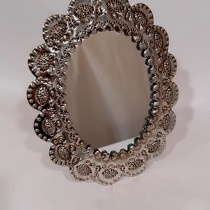 Handmade punched tin oval mirror, espejo  de hojalata