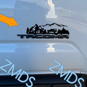 Tacoma 2nd/3rd/4th gen Mountain/tree decal. Side badge or flat bottom, 5 different truck styles OR no truck options,  Custom phrase options.