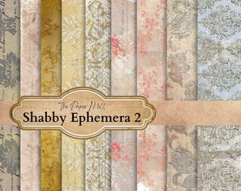 May include: A collection of vintage-style papers with various patterns and textures. The papers feature floral, damask, and script designs in muted tones of beige, cream, and pink. The text "The Paper Mill Shabby Ephemera 2" is displayed on a banner.