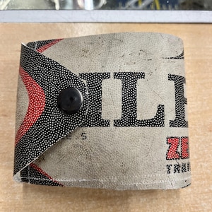 Upcycled rugby ball wallet