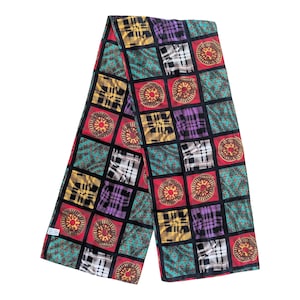 May include: A colorful scarf with a patchwork design. The scarf features squares of red, teal, yellow, purple, and black, each with unique patterns including plaid and floral motifs. The scarf is made of a soft material.