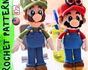 May include: Two crocheted plush toys, one green and one red, resembling the characters Mario and Luigi from the video game Super Mario Bros. The toys are standing on a table with a green and white pencil holder.