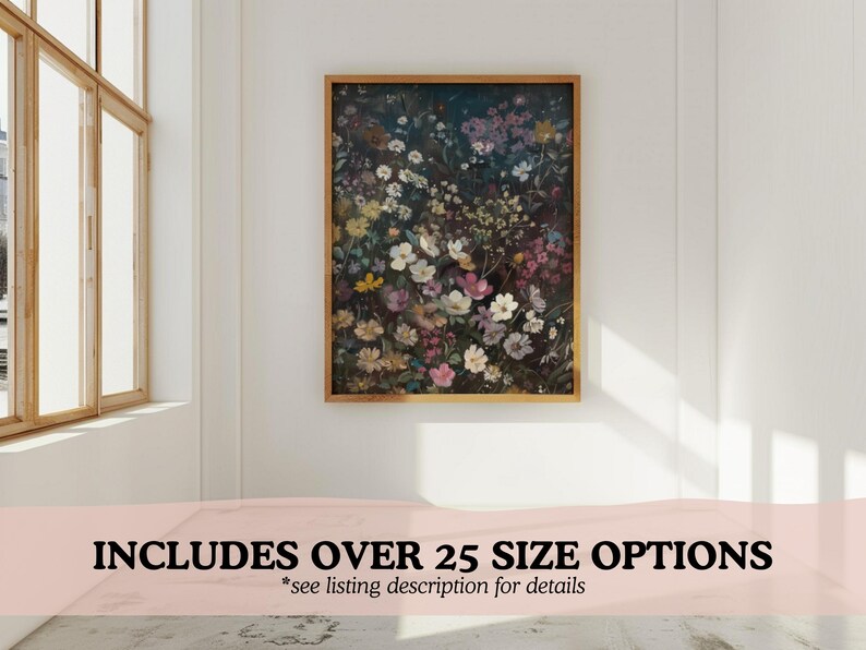 May include: A framed print of a floral arrangement featuring a variety of flowers in shades of pink, white, and purple. The flowers are arranged in a dense cluster, creating a vibrant and colourful display. The background is a dark, almost black, colour, which provides a striking contrast to the bright flowers.
