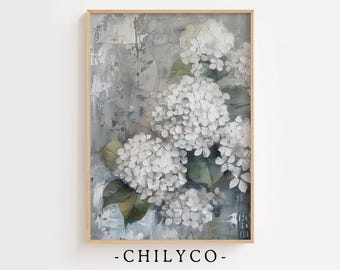 May include: A framed floral print featuring white hydrangea blooms against a textured gray and white background. The artwork has a painterly style with visible brushstrokes and green leaves. The bottom of the frame includes the text "-CHILYCO-".