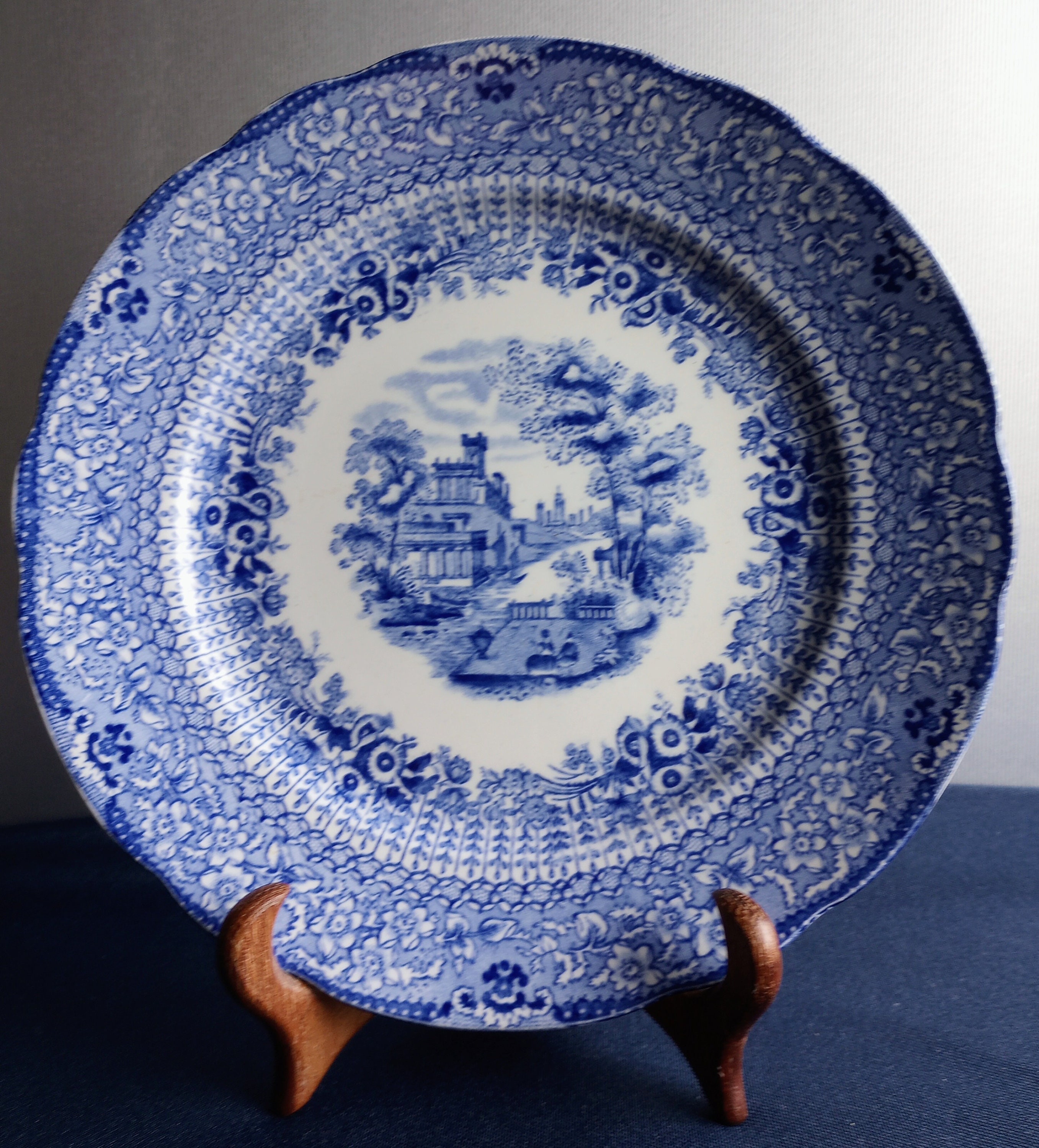 Ridgways Antique Blue Flow Plate. Grecian pattern. Eight inches. Made in England. 1891-1920. Elegant. Amazing condition.