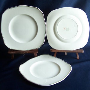 Wedgwood Vintage from Wedgwood of Etruria and Barlaston.Three 1940’s ERA 8-1/2” Side Plates Semi-scalloped edges. Unusual shape.