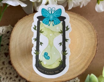 Good Things Take Time Sticker – Fantasy Hourglass Affirmation Vinyl Sticker | Matte Die-Cut Sticker with Butterfly & Vines
