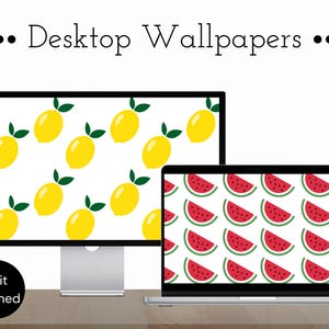 May include: Two computer screens displaying fruit-themed desktop wallpapers. The left screen shows a white background with yellow lemons and green leaves. The right screen shows a white background with red watermelon slices.