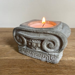 Greek Ionic column style tea light candle holder.