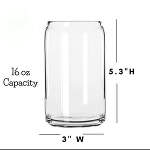 May include: A clear glass 16 ounce capacity can shaped drinking glass. The glass is 5.3 inches tall and 3 inches wide.