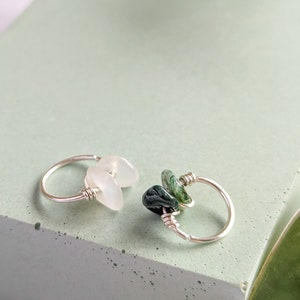 From left to right: 10mm moonstone, 10mm moss agate