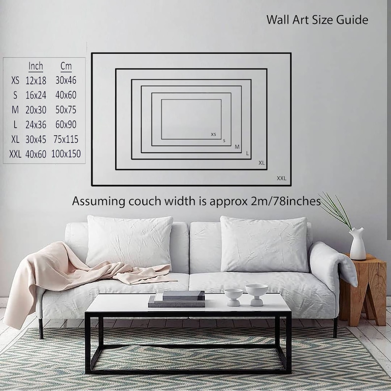 May include: A guide to wall art sizes, showing different sizes of framed artwork on a wall above a white couch. The sizes are listed in inches and centimeters. The text "Assuming couch width is approx 2m/78inches" is also included.