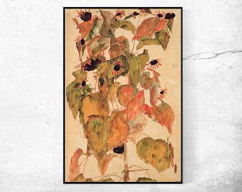 May include: A framed watercolor painting of sunflowers. The artwork features a central stalk with large, colorful leaves in shades of green, orange, and red. Several sunflowers with dark centers are scattered throughout the composition.