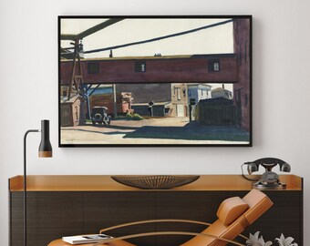May include: A framed painting depicting an urban scene with a bridge-like structure and a vintage car. The artwork features muted tones of brown, gray, and blue, creating a vintage aesthetic. The painting is displayed above a modern wooden cabinet.