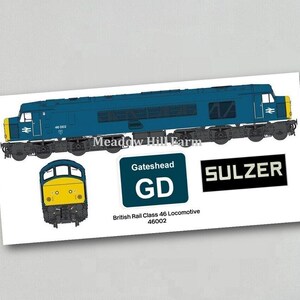 May include: A blue British Rail Class 46 locomotive illustration. The image includes a side view of the train, a front view, and logos for Gateshead GD and Sulzer. Text reads "British Rail Class 46 Locomotive 46002".