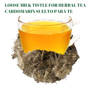 May include: A clear glass teacup filled with golden-yellow liquid, resting on a bed of dried, fibrous plant material. The text at the top reads "LOOSE MILK TISTLE FOR HERBAL TEA" and "CARDOMARIN SUELTO PARA TE".
