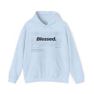 Sweat-shirt à capuche Blessed Unisex Heavy Blend™