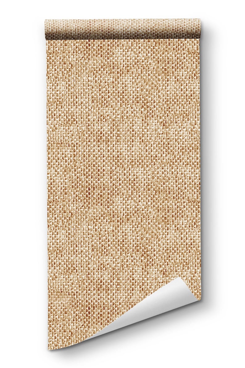 May include: A roll of brown burlap fabric with a textured weave. The fabric is rolled up and the end is curled over.